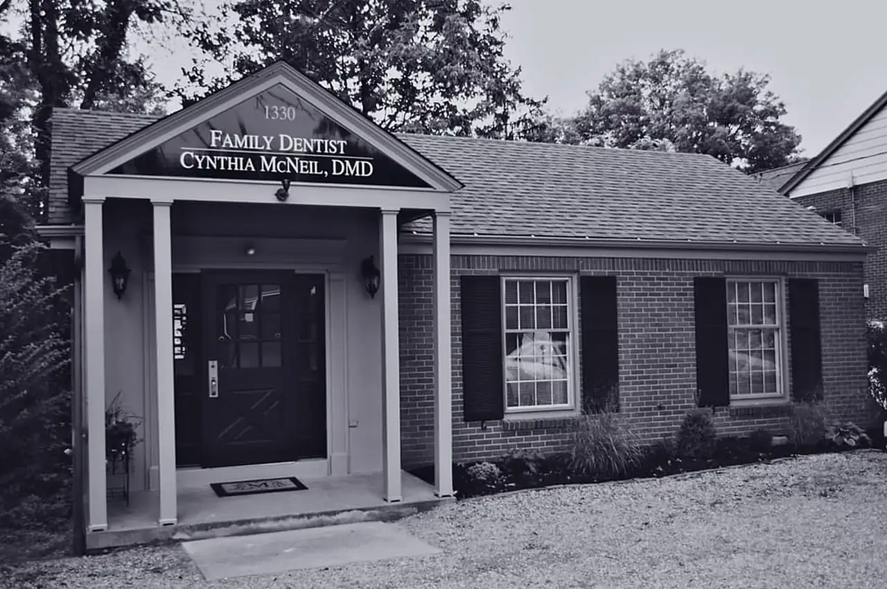 The McNeil Dental building at 1330 Freeport Rd, Fox Chapel, with the sign reading Family Dentist, Cynthia McNeil, DMD.